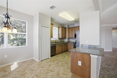 Beautiful 2/2/1 + den ground-floor corner unit in Aston Oaks at on River Hall Country Club in Florida - for sale on GolfHomes.com, golf home, golf lot