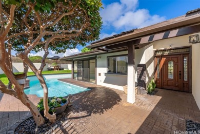 Located in the highly coveted gated community of Queen's Gate on Hawaii Kai Golf Course  in Hawaii - for sale on GolfHomes.com, golf home, golf lot