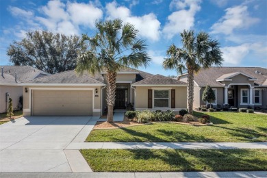 Life is better poolside! Wasting away again can be your on Arlington Ridge Golf Club in Florida - for sale on GolfHomes.com, golf home, golf lot