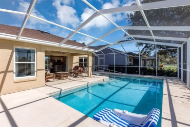 Life is better poolside! Wasting away again can be your on Arlington Ridge Golf Club in Florida - for sale on GolfHomes.com, golf home, golf lot