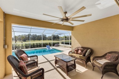 Life is better poolside! Wasting away again can be your on Arlington Ridge Golf Club in Florida - for sale on GolfHomes.com, golf home, golf lot