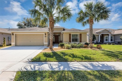 Life is better poolside! Wasting away again can be your on Arlington Ridge Golf Club in Florida - for sale on GolfHomes.com, golf home, golf lot