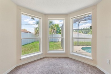 Welcome to this spacious and beautifully maintained 4 bedroom, 2 on Deltona Golf Club in Florida - for sale on GolfHomes.com, golf home, golf lot