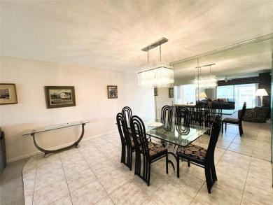 Imagine Sipping your Coffee Enjoying this Wide WATER/GOLF VIEW on Wynmoor Golf Course in Florida - for sale on GolfHomes.com, golf home, golf lot