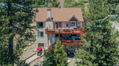 Discover luxury mountain living in this stunning 5-bedroom on Lake Arrowhead Country Club in California - for sale on GolfHomes.com, golf home, golf lot