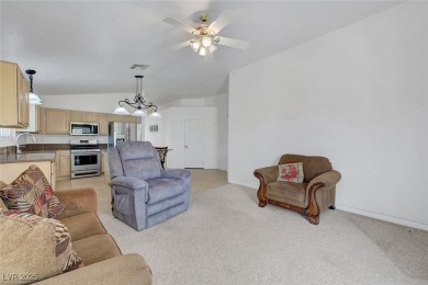 Welcome to your new home! You will find the perfect blend of on Los Prados Golf Course in Nevada - for sale on GolfHomes.com, golf home, golf lot