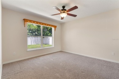 Welcome to this spacious and beautifully maintained 4 bedroom, 2 on Deltona Golf Club in Florida - for sale on GolfHomes.com, golf home, golf lot