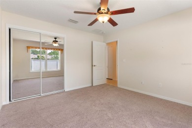 Welcome to this spacious and beautifully maintained 4 bedroom, 2 on Deltona Golf Club in Florida - for sale on GolfHomes.com, golf home, golf lot