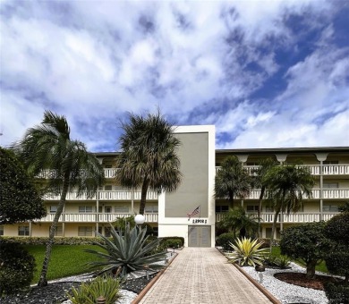Imagine Sipping your Coffee Enjoying this Wide WATER/GOLF VIEW on Wynmoor Golf Course in Florida - for sale on GolfHomes.com, golf home, golf lot