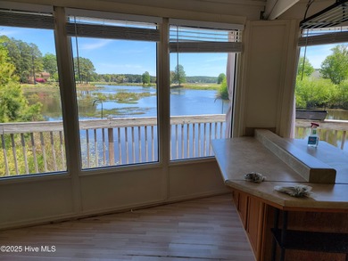 2 bedroom 2 bath waterfront home in Woodlake Country Club on Woodlake Country Club in North Carolina - for sale on GolfHomes.com, golf home, golf lot