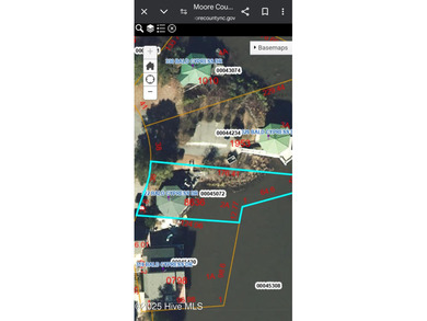 2 bedroom 2 bath waterfront home in Woodlake Country Club on Woodlake Country Club in North Carolina - for sale on GolfHomes.com, golf home, golf lot