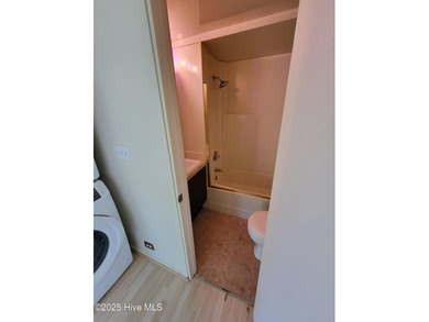 2 bedroom 2 bath waterfront home in Woodlake Country Club on Woodlake Country Club in North Carolina - for sale on GolfHomes.com, golf home, golf lot