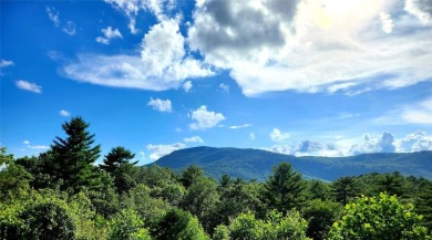 Classic in every sense of the word, this mountain chalet on Lake Toxaway Country Club in North Carolina - for sale on GolfHomes.com, golf home, golf lot