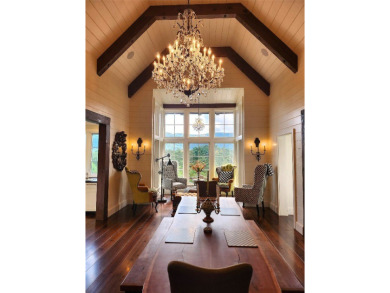 Classic in every sense of the word, this mountain chalet on Lake Toxaway Country Club in North Carolina - for sale on GolfHomes.com, golf home, golf lot