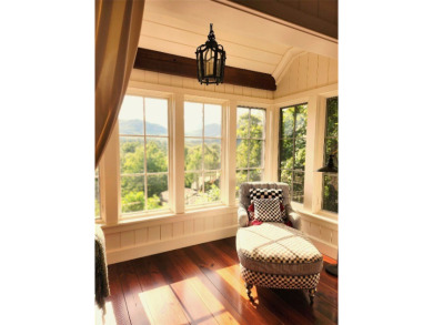 Classic in every sense of the word, this mountain chalet on Lake Toxaway Country Club in North Carolina - for sale on GolfHomes.com, golf home, golf lot
