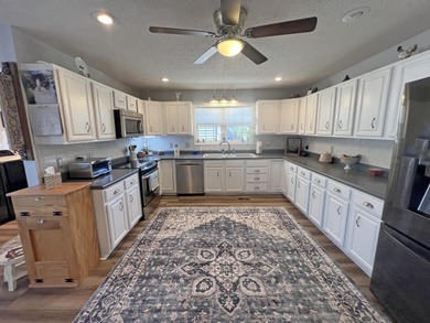 Stunning Custom Home with Deeded Boat Slip in Wyboo Plantation on Players Course At Wyboo Plantation in South Carolina - for sale on GolfHomes.com, golf home, golf lot