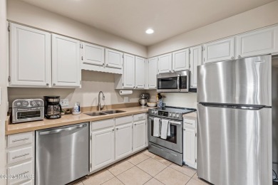 Welcome to your stunning remodeled 1-bedroom, 1-bathroom condo on Continental Country Club in Arizona - for sale on GolfHomes.com, golf home, golf lot