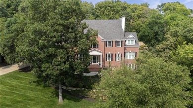 Welcome to this custom-built colonial home in the prestigious on Loch Lloyd Country Club in Missouri - for sale on GolfHomes.com, golf home, golf lot