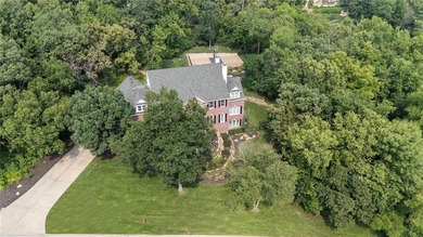 Welcome to this custom-built colonial home in the prestigious on Loch Lloyd Country Club in Missouri - for sale on GolfHomes.com, golf home, golf lot