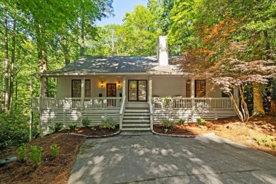 This beautiful, updated home located in Sapphire Valley sits on on Sapphire National Golf Club in North Carolina - for sale on GolfHomes.com, golf home, golf lot