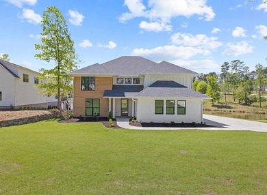 Welcome to refined modern living in the prestigious Harbor Club on Harbor Club Golf and Country Club in Georgia - for sale on GolfHomes.com, golf home, golf lot