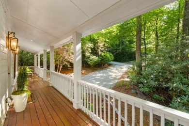 This beautiful, updated home located in Sapphire Valley sits on on Sapphire National Golf Club in North Carolina - for sale on GolfHomes.com, golf home, golf lot