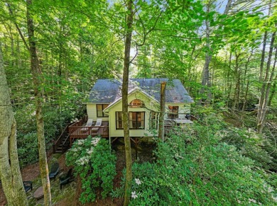 This beautiful, updated home located in Sapphire Valley sits on on Sapphire National Golf Club in North Carolina - for sale on GolfHomes.com, golf home, golf lot