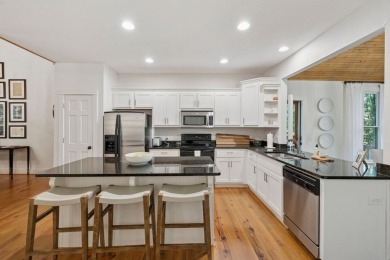 This beautiful, updated home located in Sapphire Valley sits on on Sapphire National Golf Club in North Carolina - for sale on GolfHomes.com, golf home, golf lot
