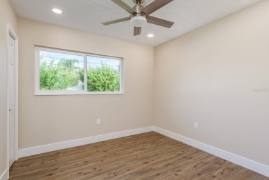 Turnkey Dunedin retreat, fully renovated from top to bottom with on The Dunedin Country Club in Florida - for sale on GolfHomes.com, golf home, golf lot