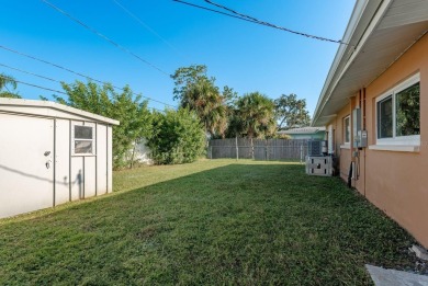 Turnkey Dunedin retreat, fully renovated from top to bottom with on The Dunedin Country Club in Florida - for sale on GolfHomes.com, golf home, golf lot