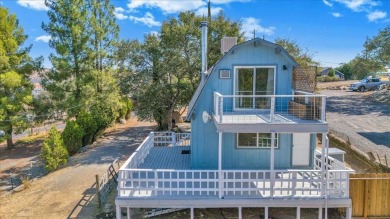 Discover a slice of vintage charm in this affordable barn-style on The Club at Copper Valley Golf Course in California - for sale on GolfHomes.com, golf home, golf lot