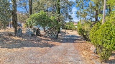 Discover a slice of vintage charm in this affordable barn-style on The Club at Copper Valley Golf Course in California - for sale on GolfHomes.com, golf home, golf lot