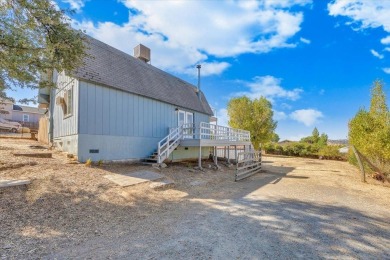 Discover a slice of vintage charm in this affordable barn-style on The Club at Copper Valley Golf Course in California - for sale on GolfHomes.com, golf home, golf lot