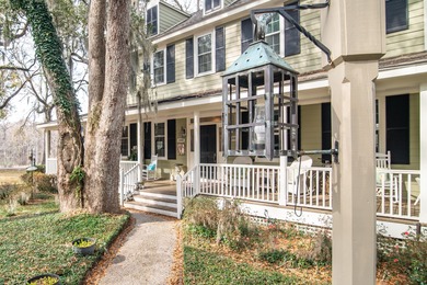 Experience the charm of this cozy townhome, tucked beneath the on Wachesaw Plantation Club in South Carolina - for sale on GolfHomes.com, golf home, golf lot