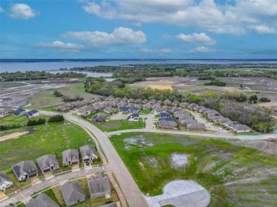 Experience the epitome of luxury living with this prime CORNER on Heath Golf and Yacht Club in Texas - for sale on GolfHomes.com, golf home, golf lot