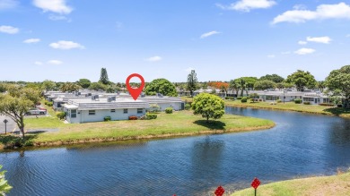 Waterfront Elegance | 2BR/2BA in King's Point Golf & Country on Kings Point Golf -Flanders Way in Florida - for sale on GolfHomes.com, golf home, golf lot