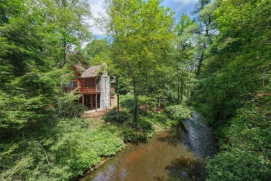 Welcome to a sophisticated mountain retreat on the banks of the on Cullasaja Club in North Carolina - for sale on GolfHomes.com, golf home, golf lot