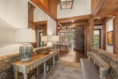 Welcome to a sophisticated mountain retreat on the banks of the on Cullasaja Club in North Carolina - for sale on GolfHomes.com, golf home, golf lot