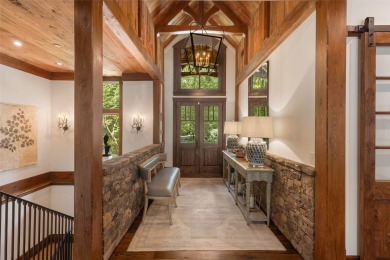 Welcome to a sophisticated mountain retreat on the banks of the on Cullasaja Club in North Carolina - for sale on GolfHomes.com, golf home, golf lot
