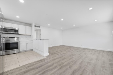 Waterfront Elegance | 2BR/2BA in King's Point Golf & Country on Kings Point Golf -Flanders Way in Florida - for sale on GolfHomes.com, golf home, golf lot