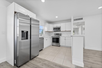 Waterfront Elegance | 2BR/2BA in King's Point Golf & Country on Kings Point Golf -Flanders Way in Florida - for sale on GolfHomes.com, golf home, golf lot