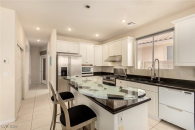 This stunning home features a temperature-controlled, insulated on Rio Secco Golf Club in Nevada - for sale on GolfHomes.com, golf home, golf lot