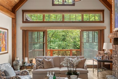Welcome to a sophisticated mountain retreat on the banks of the on Cullasaja Club in North Carolina - for sale on GolfHomes.com, golf home, golf lot