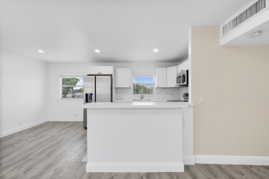 Waterfront Elegance | 2BR/2BA in King's Point Golf & Country on Kings Point Golf -Flanders Way in Florida - for sale on GolfHomes.com, golf home, golf lot