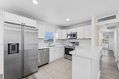 Waterfront Elegance | 2BR/2BA in King's Point Golf & Country on Kings Point Golf -Flanders Way in Florida - for sale on GolfHomes.com, golf home, golf lot