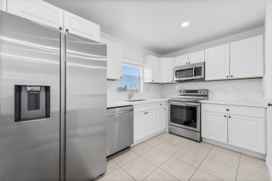 Waterfront Elegance | 2BR/2BA in King's Point Golf & Country on Kings Point Golf -Flanders Way in Florida - for sale on GolfHomes.com, golf home, golf lot