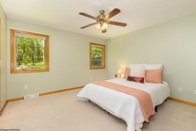 Welcome to 'Nature's Nook', a beautiful cape cod cabin located on Alpine Lake Resort in West Virginia - for sale on GolfHomes.com, golf home, golf lot
