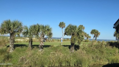 Before stepping into this beautiful 2BR/2BA Sanddown home, pause on Ocean Creek Golf Course in South Carolina - for sale on GolfHomes.com, golf home, golf lot