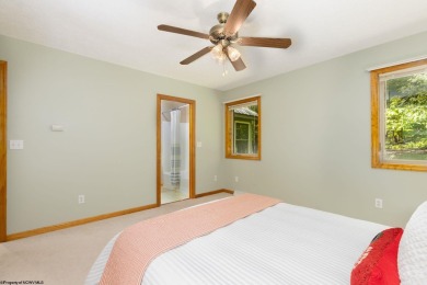 Welcome to 'Nature's Nook', a beautiful cape cod cabin located on Alpine Lake Resort in West Virginia - for sale on GolfHomes.com, golf home, golf lot