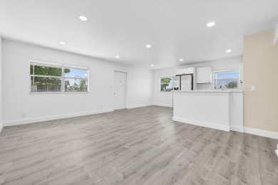 Waterfront Elegance | 2BR/2BA in King's Point Golf & Country on Kings Point Golf -Flanders Way in Florida - for sale on GolfHomes.com, golf home, golf lot